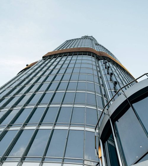 tall-glass-building-against-blue-sky-view-from-th-2023-11-27-05-02-25-utc.jpg tall-glass-building-against-blue-sky-view-from-th-2023-11-27-05-02-25-utc.jpg